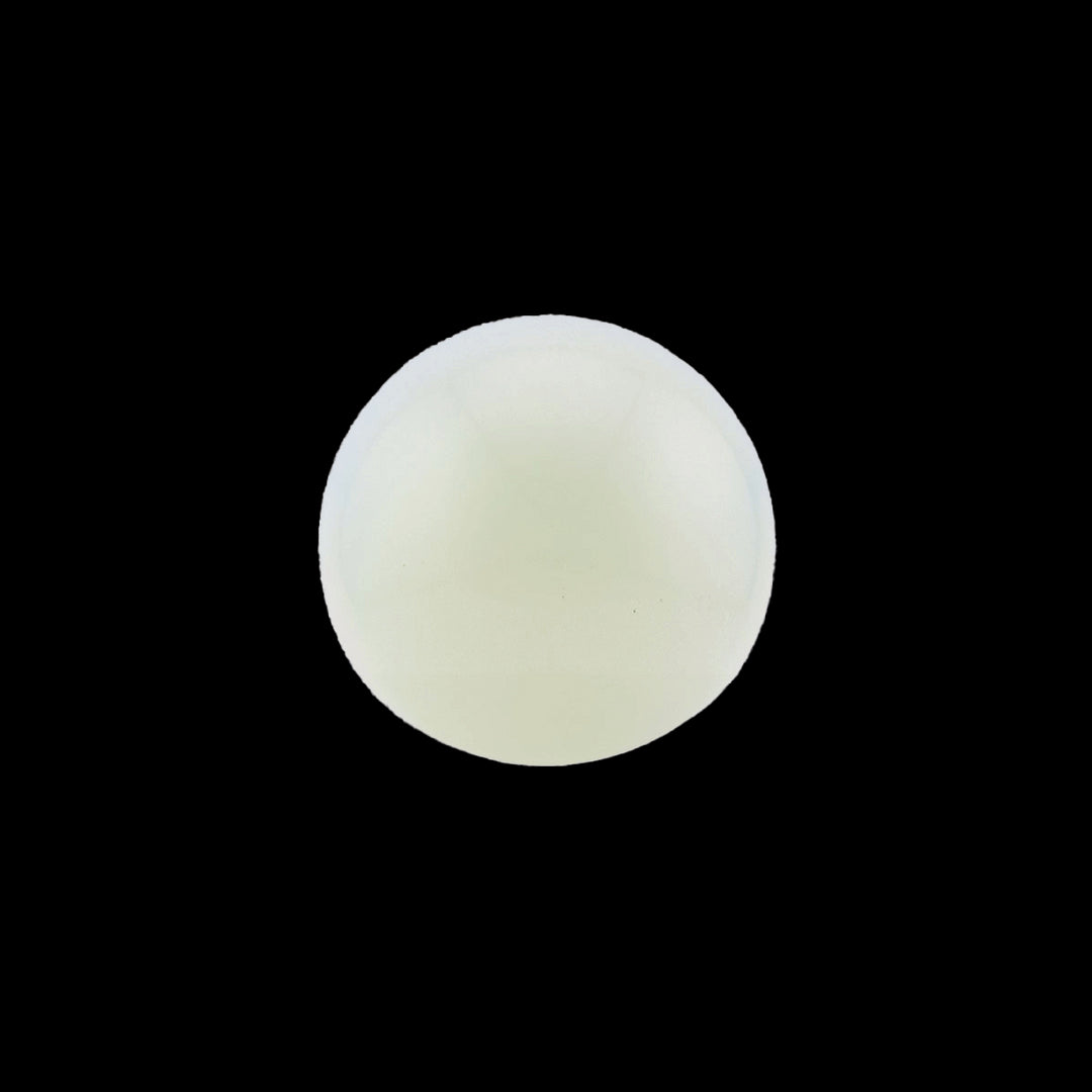 Opalite sphere with translucent and milky colors, resembling moonlight.