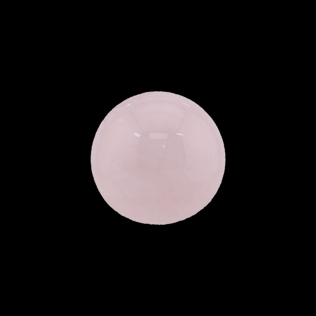 Rose Quartz sphere with gentle pink hues, symbolizing love and healing.