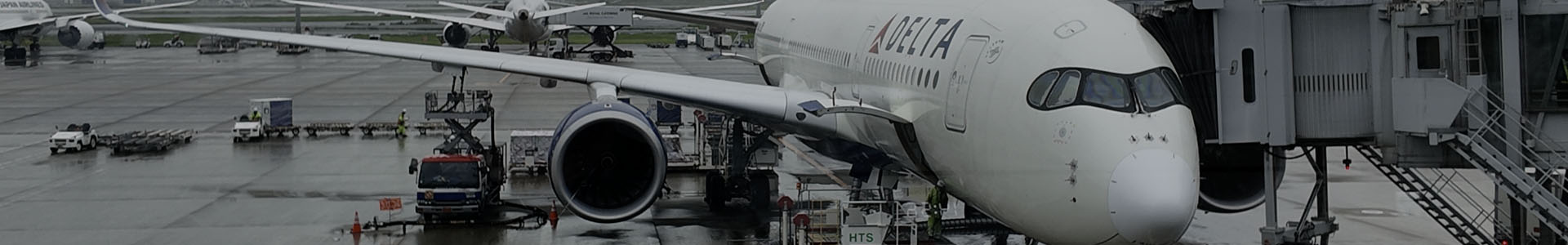 Airplane at Tokyo Airport getting ready to embark on a flight to Kushiro, Japan.