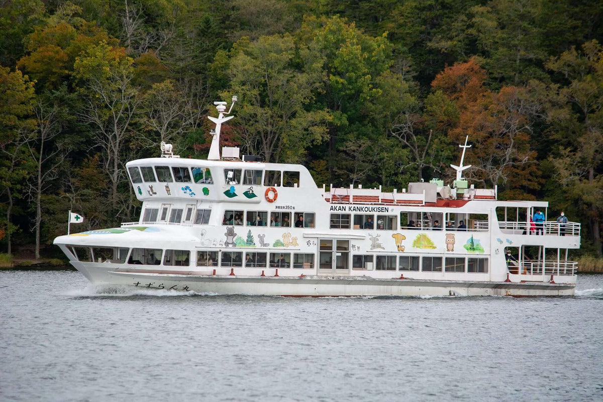 Lake Akan ferry en route to Churui Island, where travelers can visit the Marimo Exhibition Center in Hokkaido, Japan.