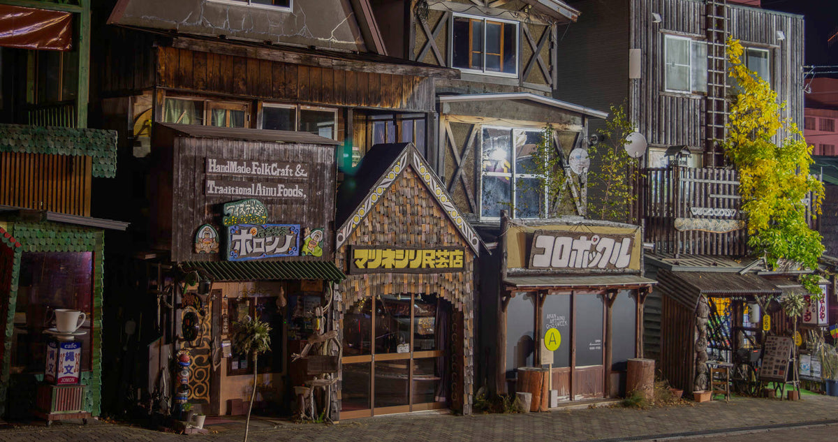 Akanko Onsen Village storefronts in Lake Akan, Japan — home of the Marimo moss ball.